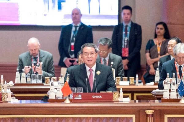 图为当地时间9日在印度新德里举行的G20峰会上，中国总理李强正在发言。【照片来源：新华社=韩联社】